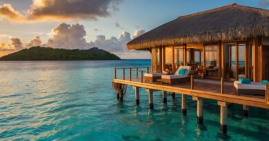 Private overwater bungalow in the Maldives at sunset, ideal for honeymooners.